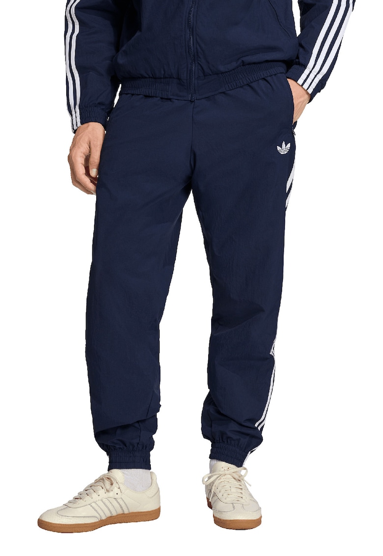 Pantaloni de trening cu benzi contrastante si terminatii cu fermoar Firebird - Alb/Albastru ultramarin