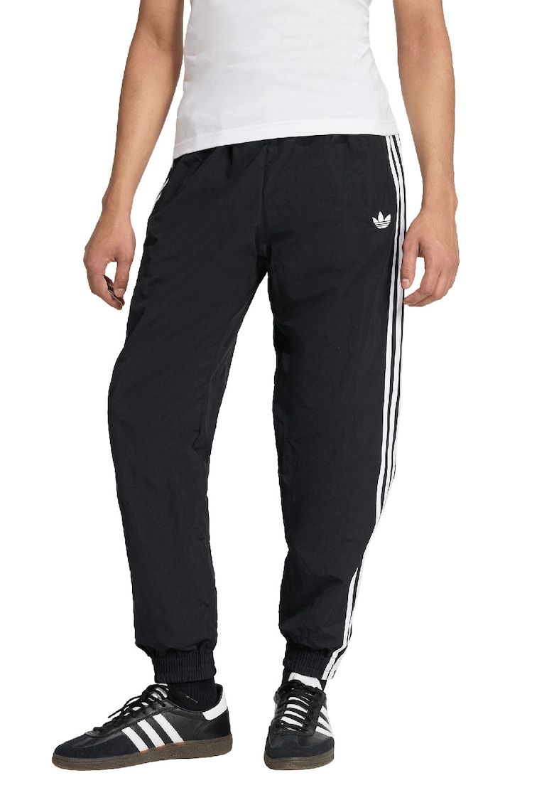Pantaloni de trening cu benzi contrastante si terminatii cu fermoar Firebird - Alb/Negru