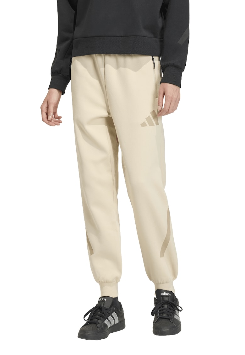 Pantaloni de trening cu buzunare cu fermoar Z.N.E. - Bej deschis