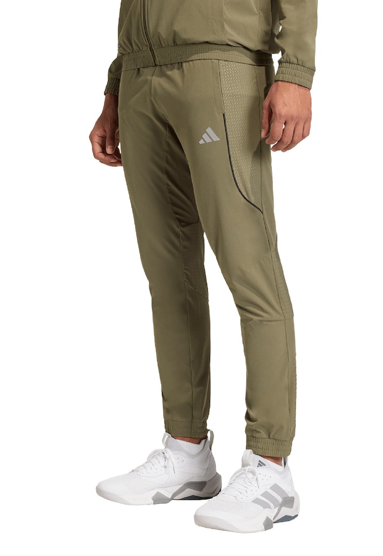 Pantaloni slim fit pentru fitness Tech - Verde sparanghel