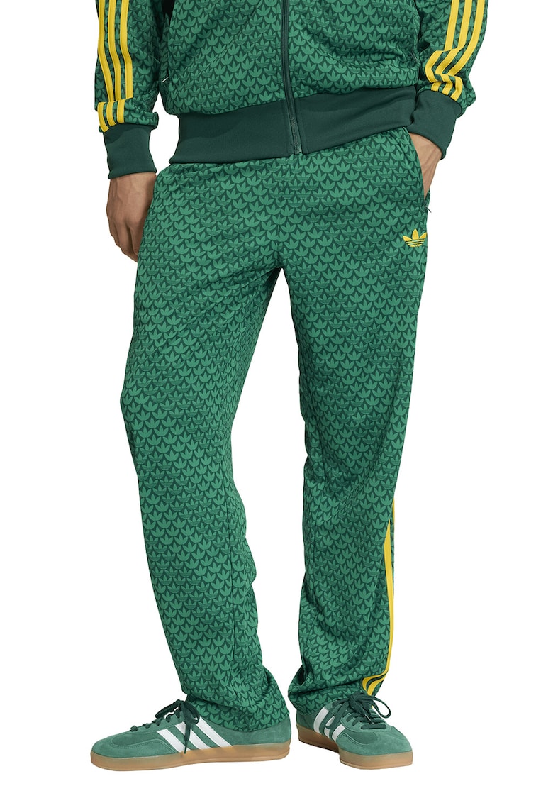 Pantaloni de trening cu model monograma si slituri cu fermoar la glezna - Verde/Galben