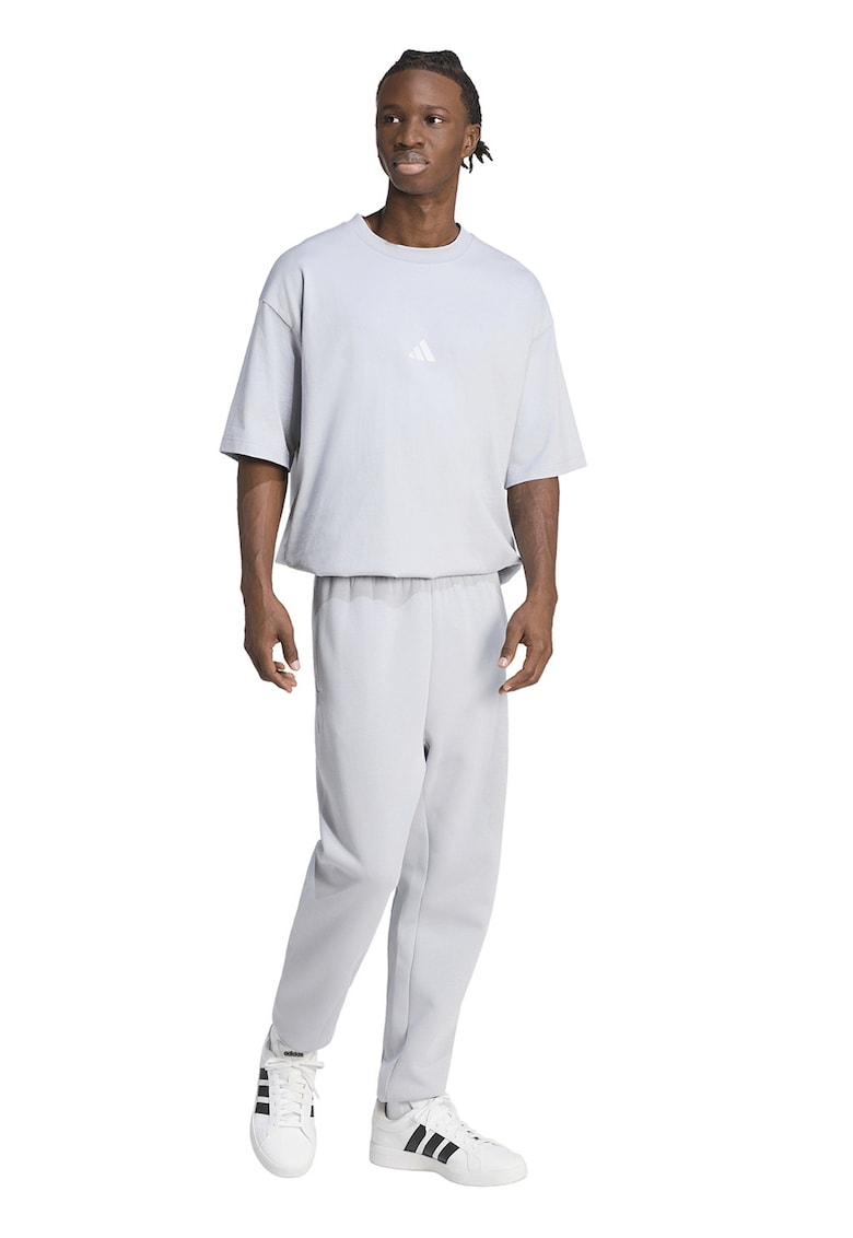 Pantaloni de trening conici cu buzunare laterale - Gri deschis