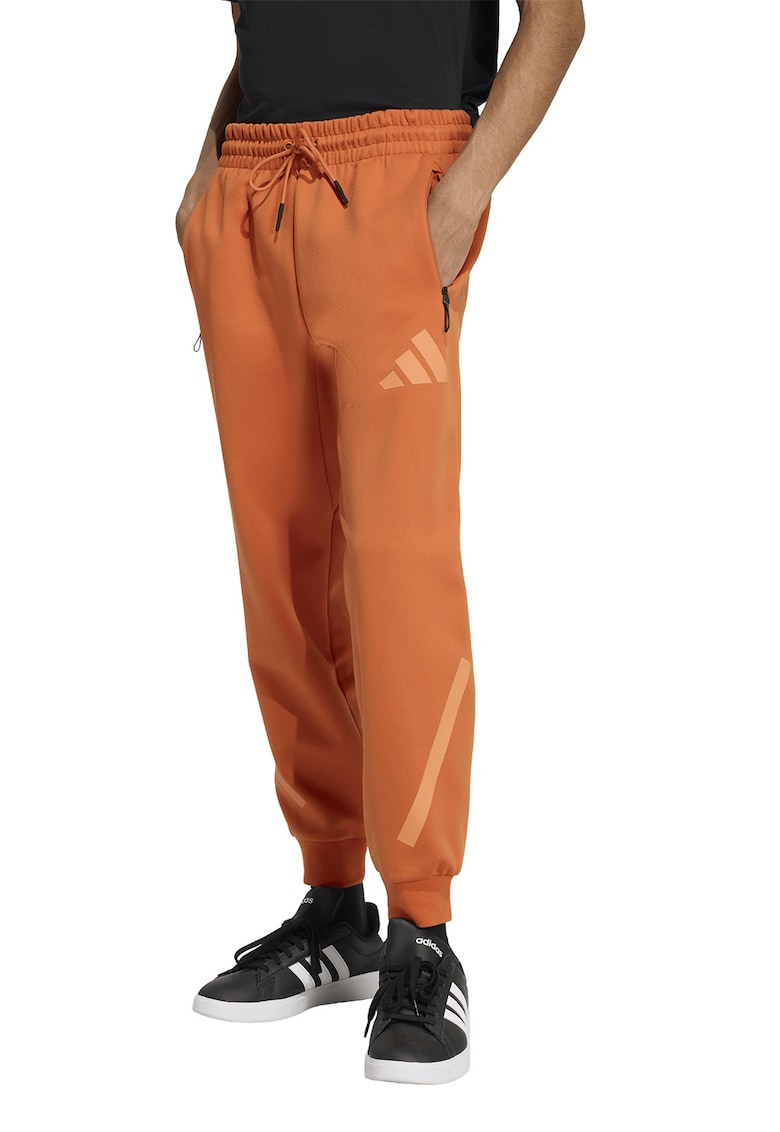 Pantaloni de trening relaxed fit cu snur Z.N.E. - Portocaliu