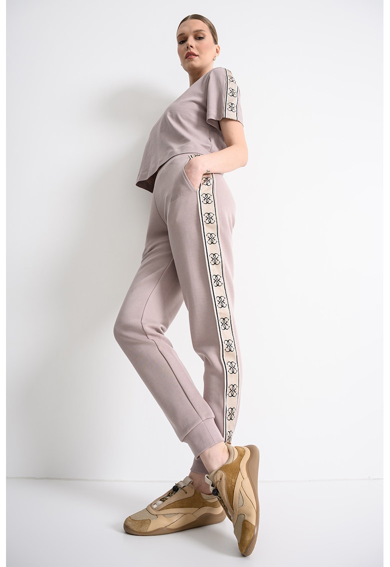 Pantaloni de trening cu croiala conica si segmente laterale cu logo - Roz prafuit