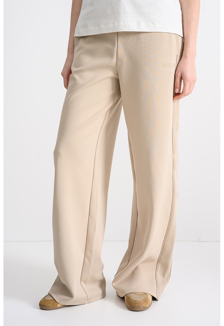 Pantaloni de trening cu croiala ampla si buzunare laterale - Bej