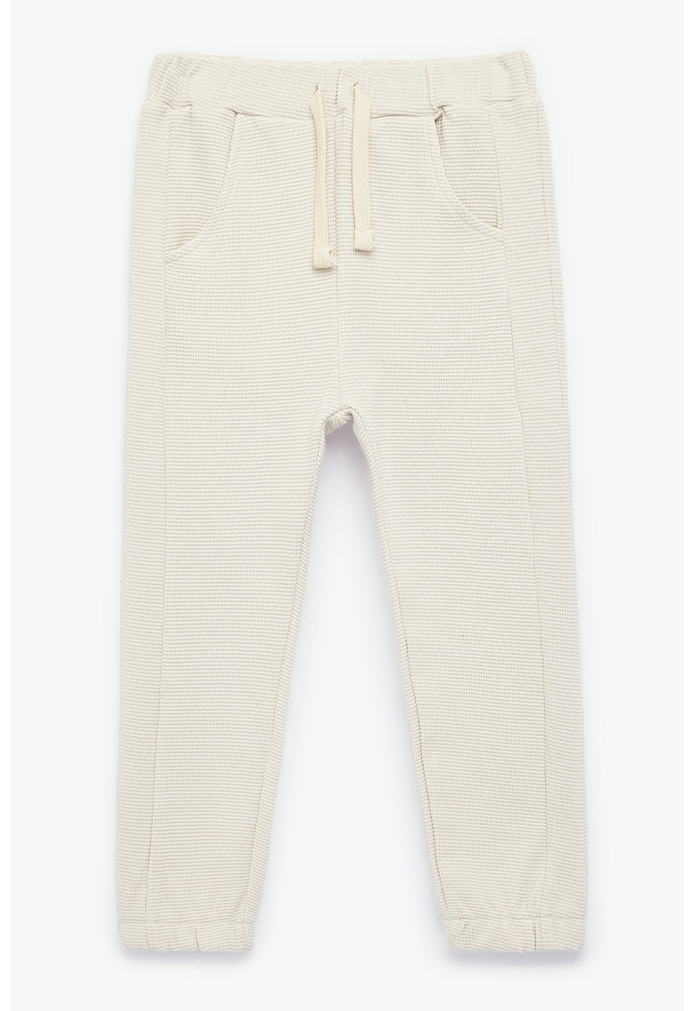 Pantaloni de trening din bumbac cu model texturat - Bej