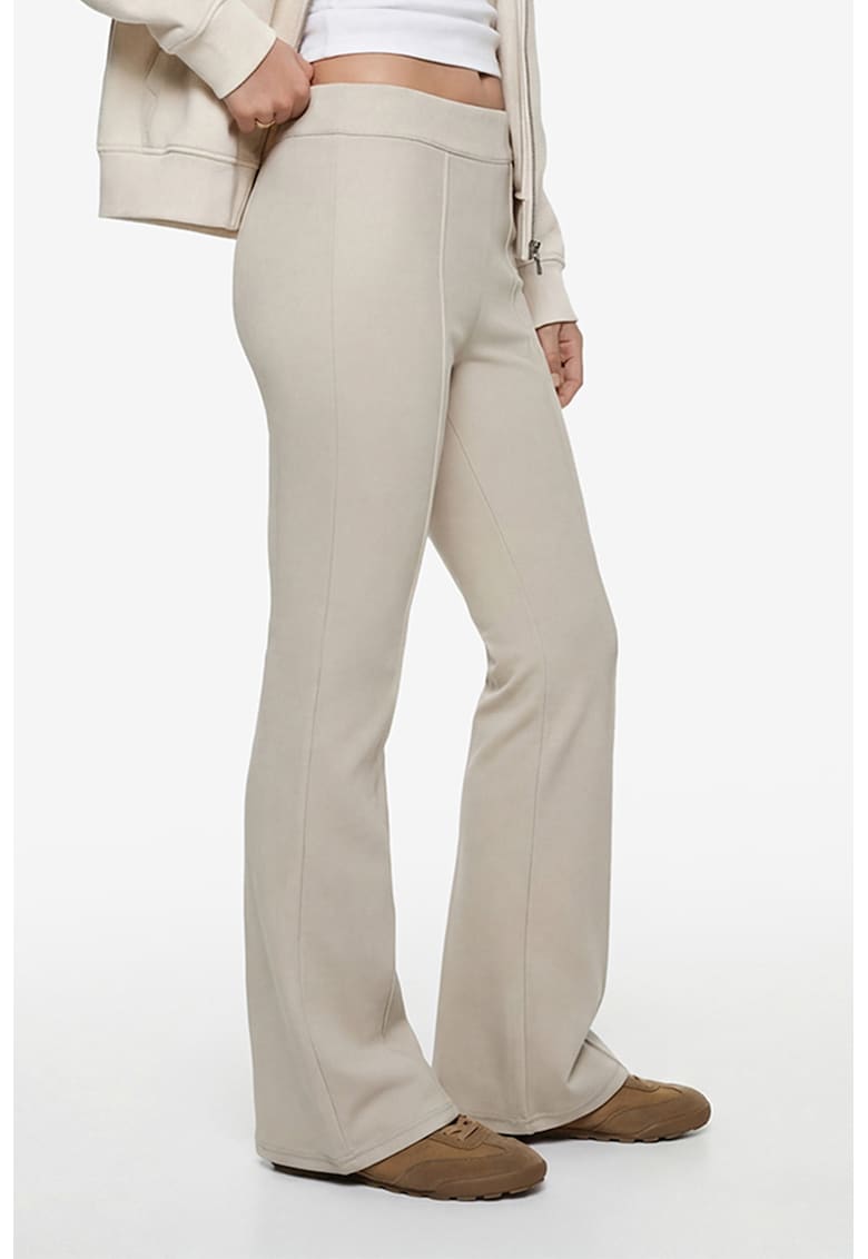 Pantaloni evazati cu talie inalta si model uni - Crem