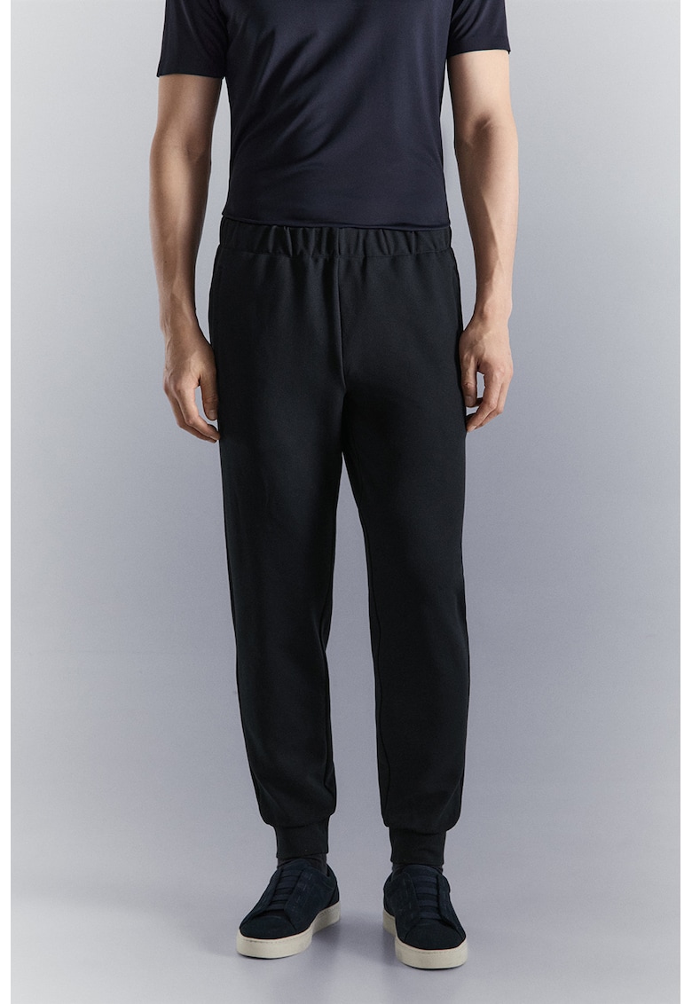 Pantaloni de trening cu model uni si terminatii elastice - Albastru ultramarin