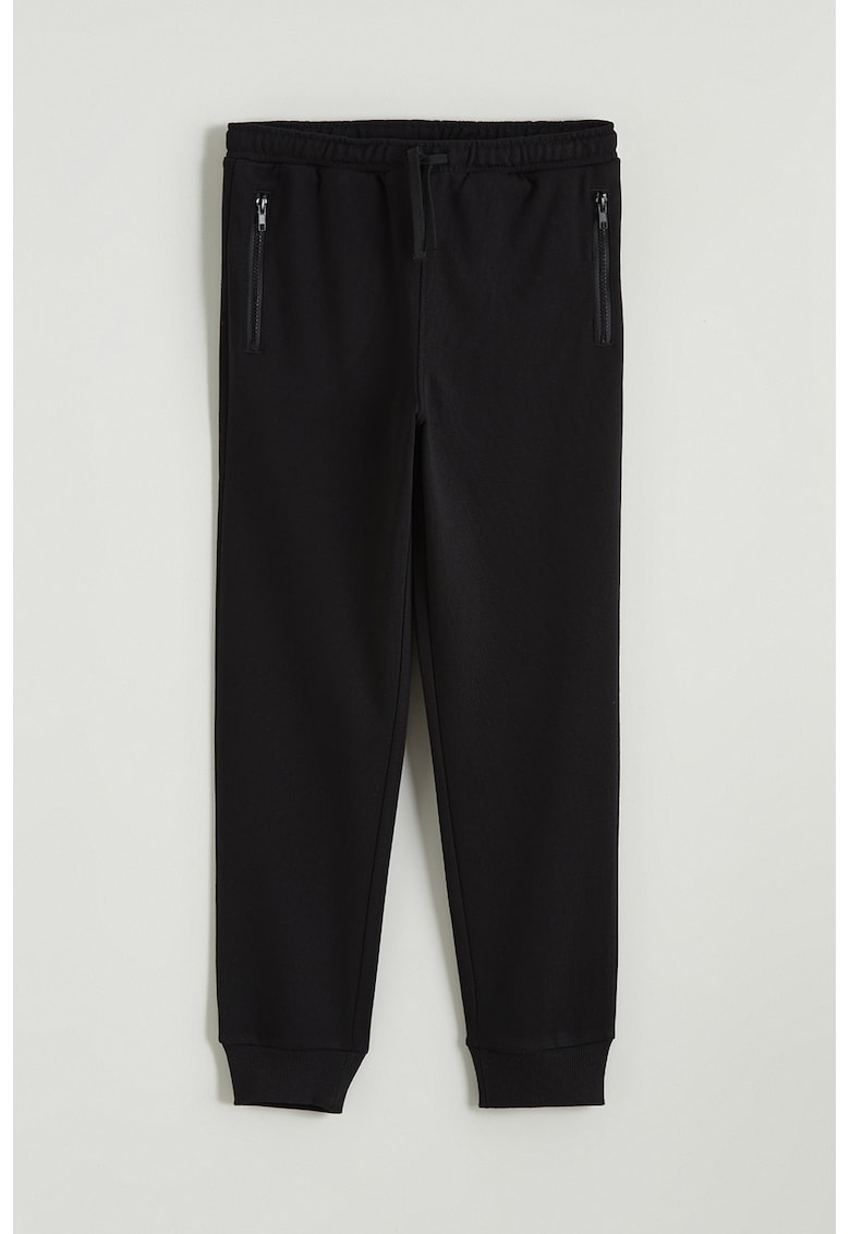 Pantaloni de trening cu buzunare cu fermoar si model uni - Negru -