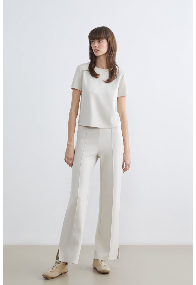 Pantaloni slim fit cu slituri la terminatie - Alb fildes