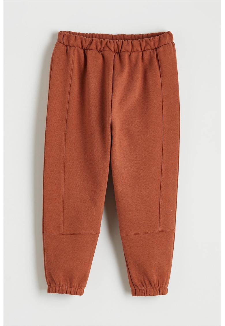 Pantaloni de trening cu croiala conica si model uni - Caramiziu