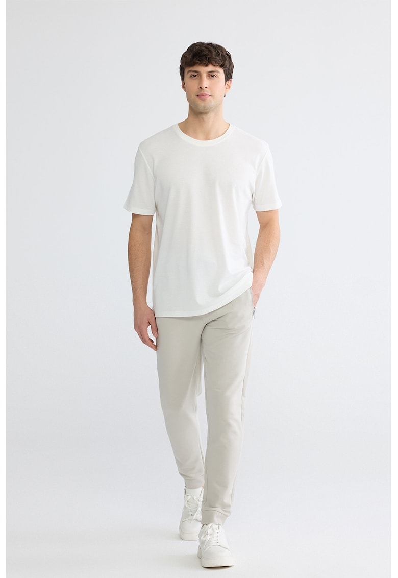 Pantaloni de trening cu buzunare cu fermoar - Verde pal