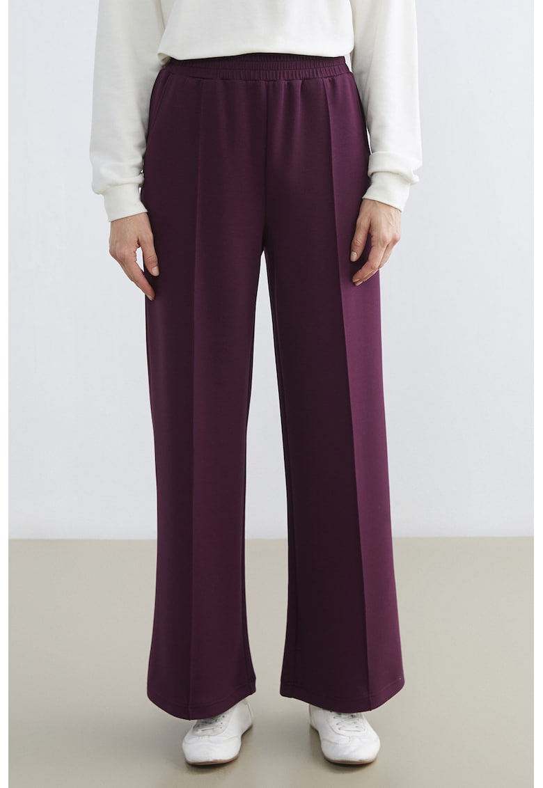 Pantaloni de trening cu croiala evazata si model uni - Violet tyrian