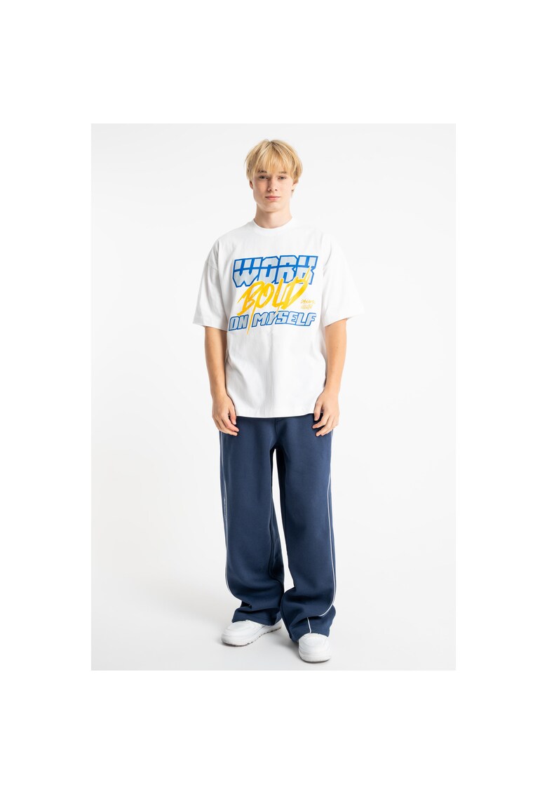 Pantaloni de trening cu talie ajustabila si croiala ampla