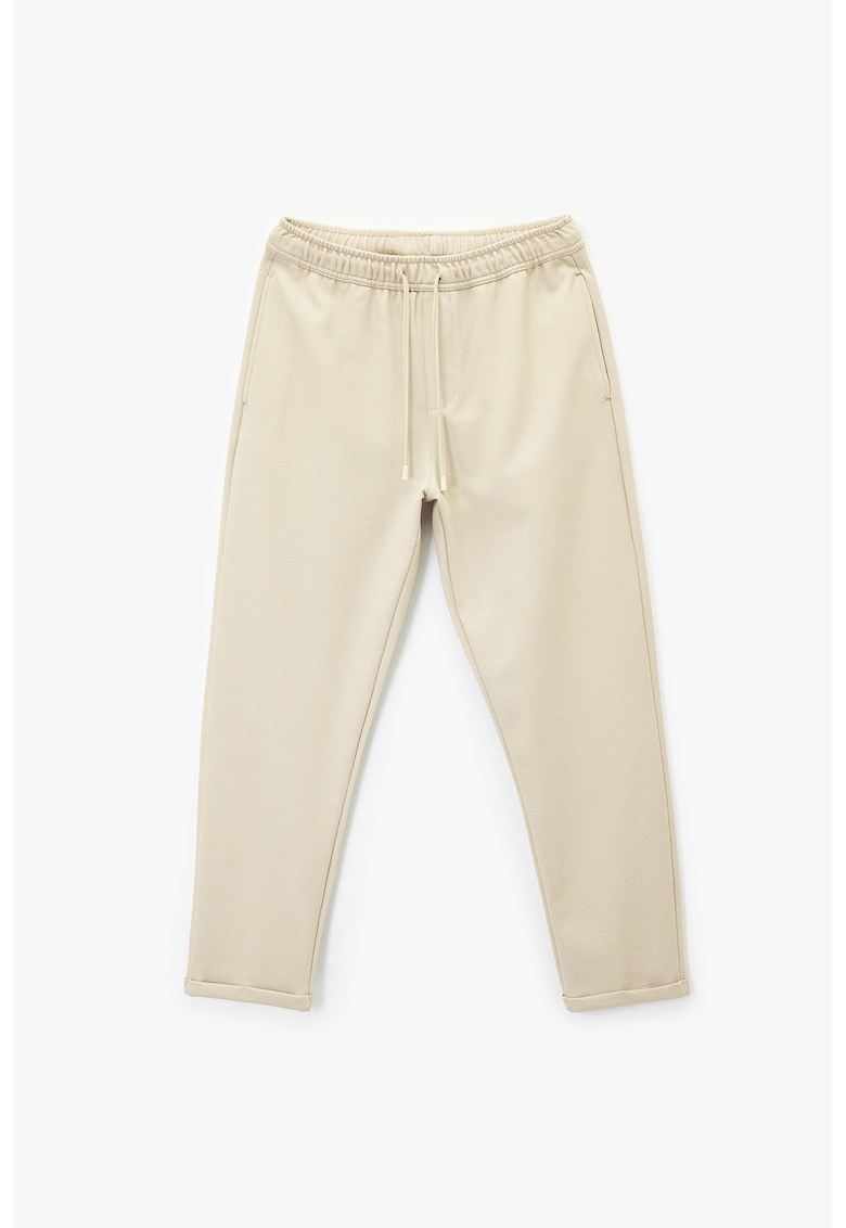Pantaloni texturati de trening cu buzunare laterale - Bej