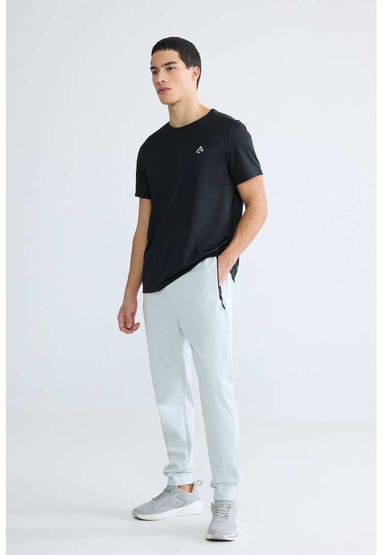 Pantaloni de trening cu slit cu fermoar la terminatii - Negru/Gri deschis