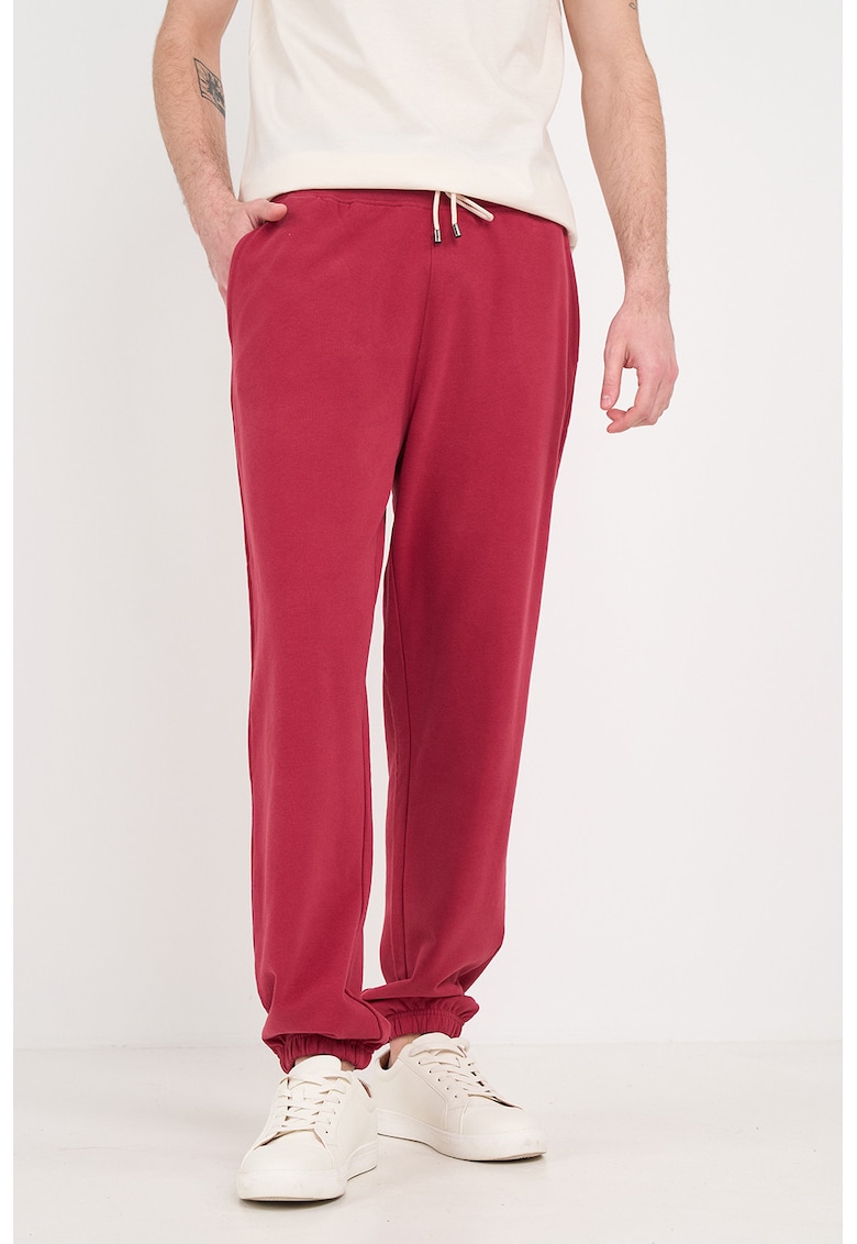 Pantaloni de trening cu croiala conica si snur de ajustare - Rosu capsuna