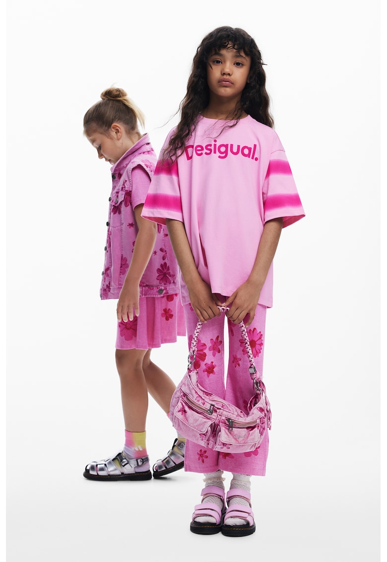 Pantaloni evazati cu model floral - Roz