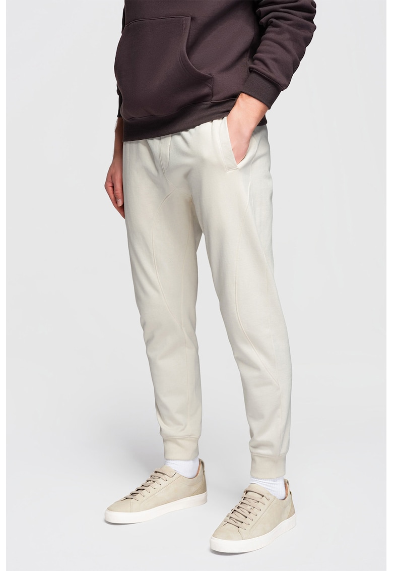 Pantaloni de trening din bumbac cu snururi de ajustare - Crem