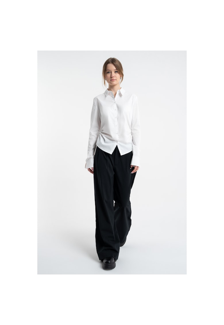 Pantaloni largi cu buzunare oblice