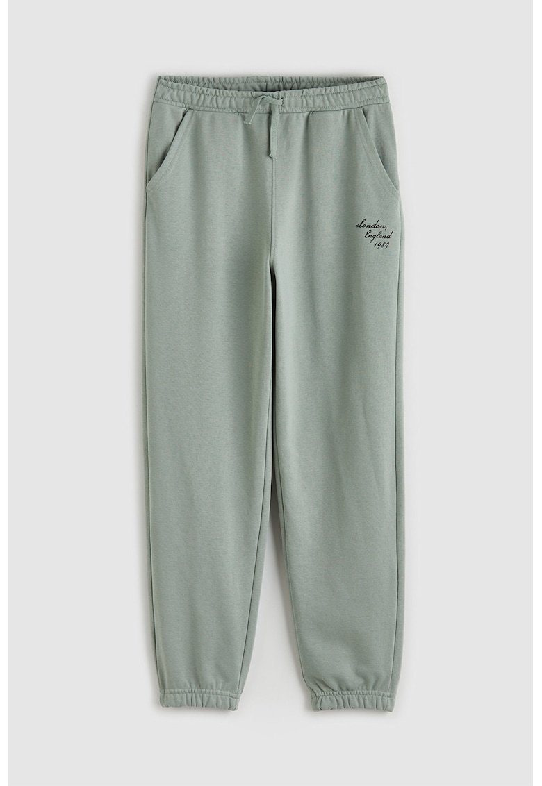 Pantaloni de trening cu imprimeu text discret - Verde pastel