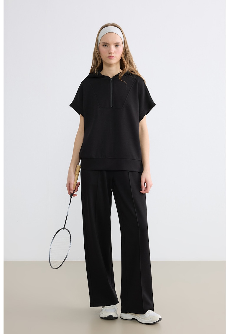 Pantaloni de trening cu croiala ampla si banda elastica in talie - Negru