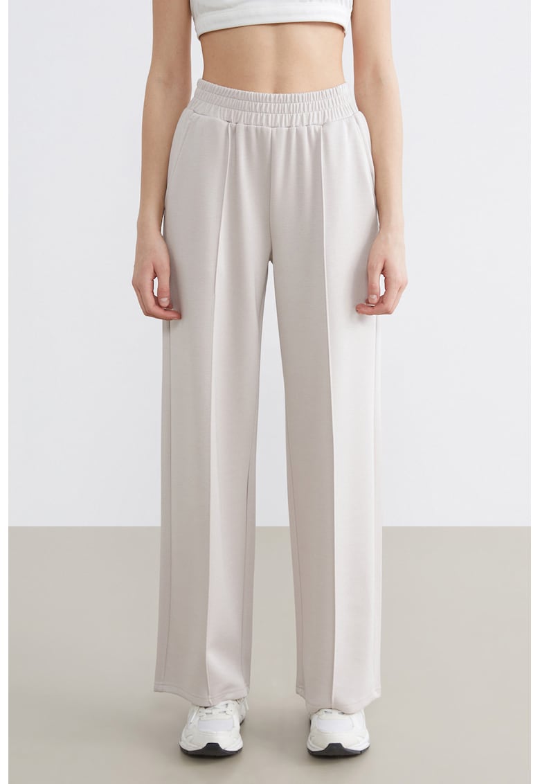 Pantaloni de trening cu croiala ampla si banda elastica in talie - Maro nisip