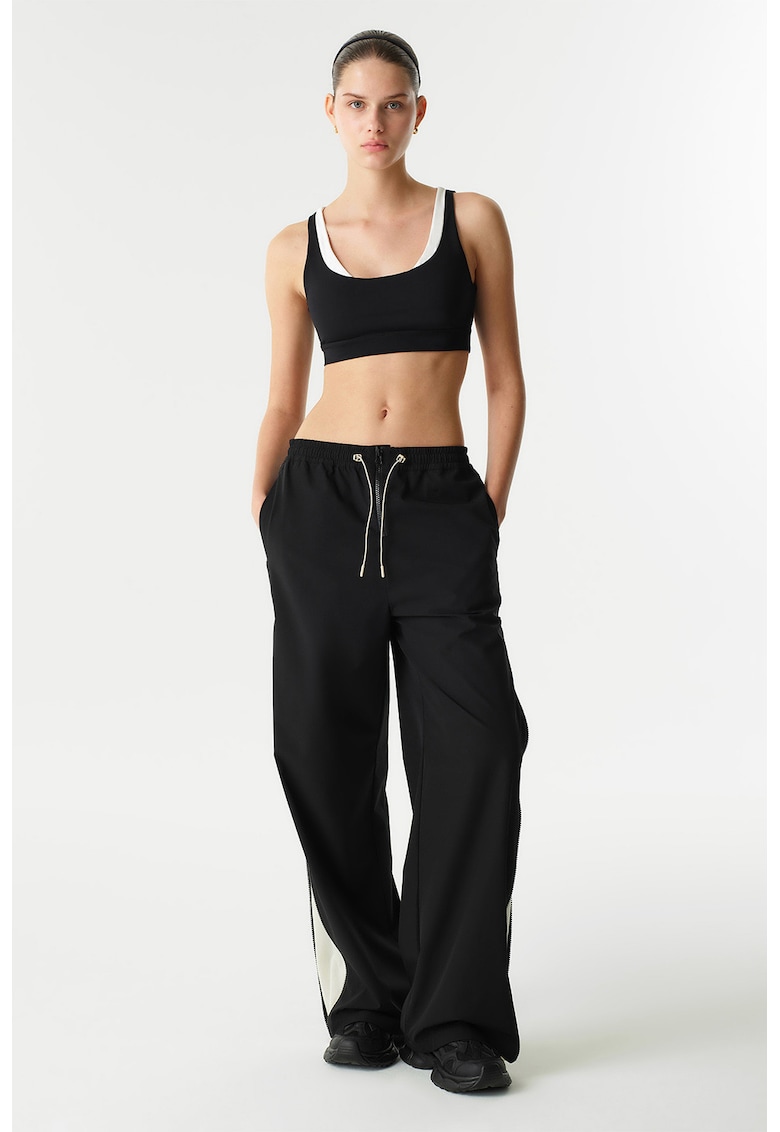 Pantaloni de trening cu croiala ampla si fermoare laterale - Negru