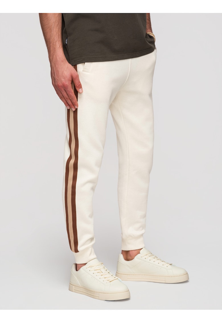 Pantaloni jogger cu elastic si buzunare laterale din material moale - Crem