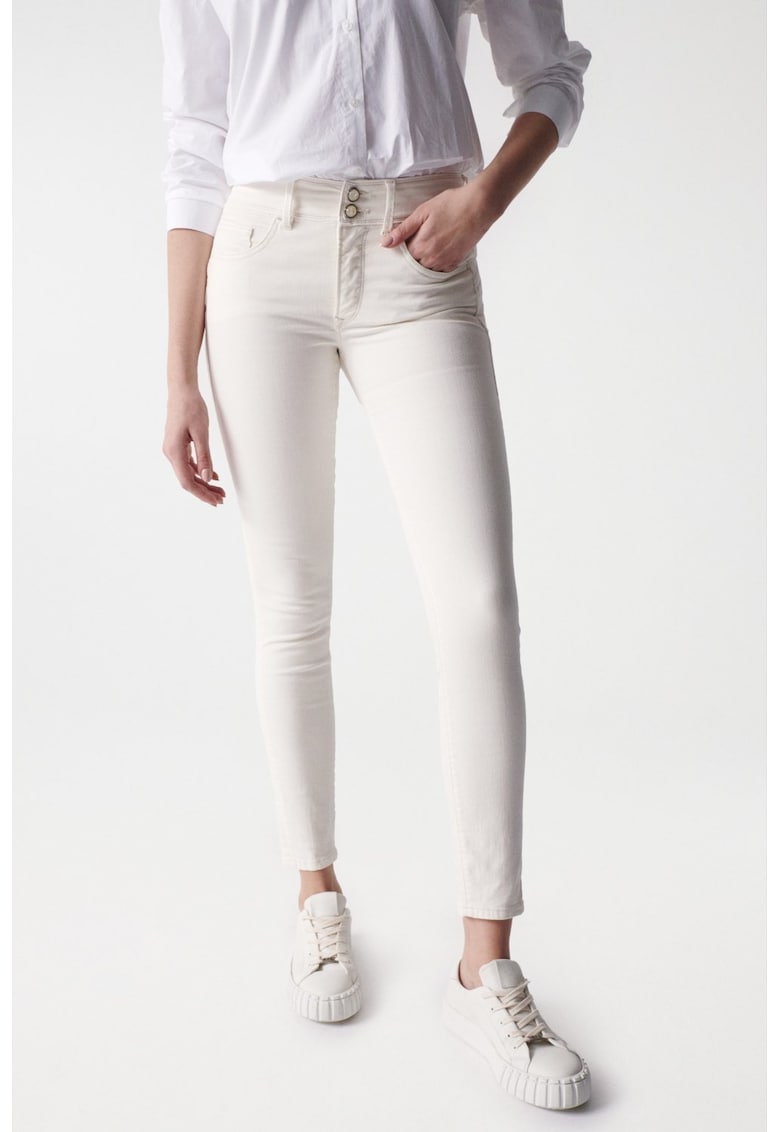 Blugi skinny cu talie medie.