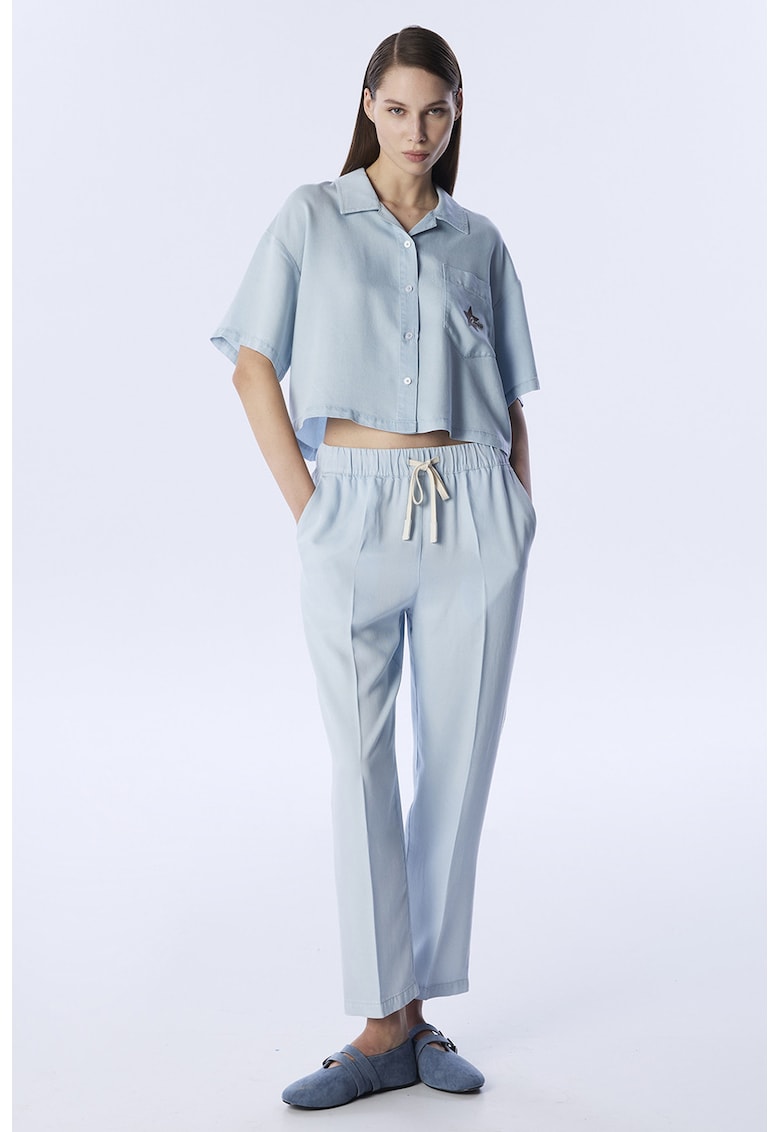 Pantaloni conici din lyocell - Albastru pastel