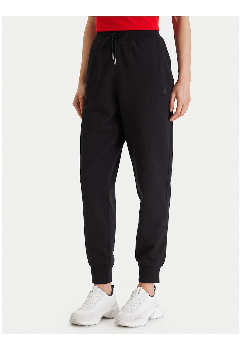 Pantaloni de trening conici cu buzunare -