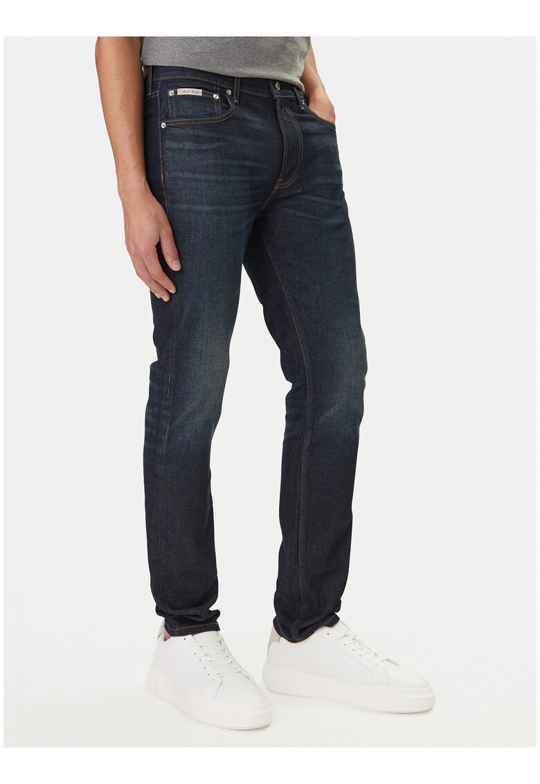 Blugi slim fit cu croiala conica