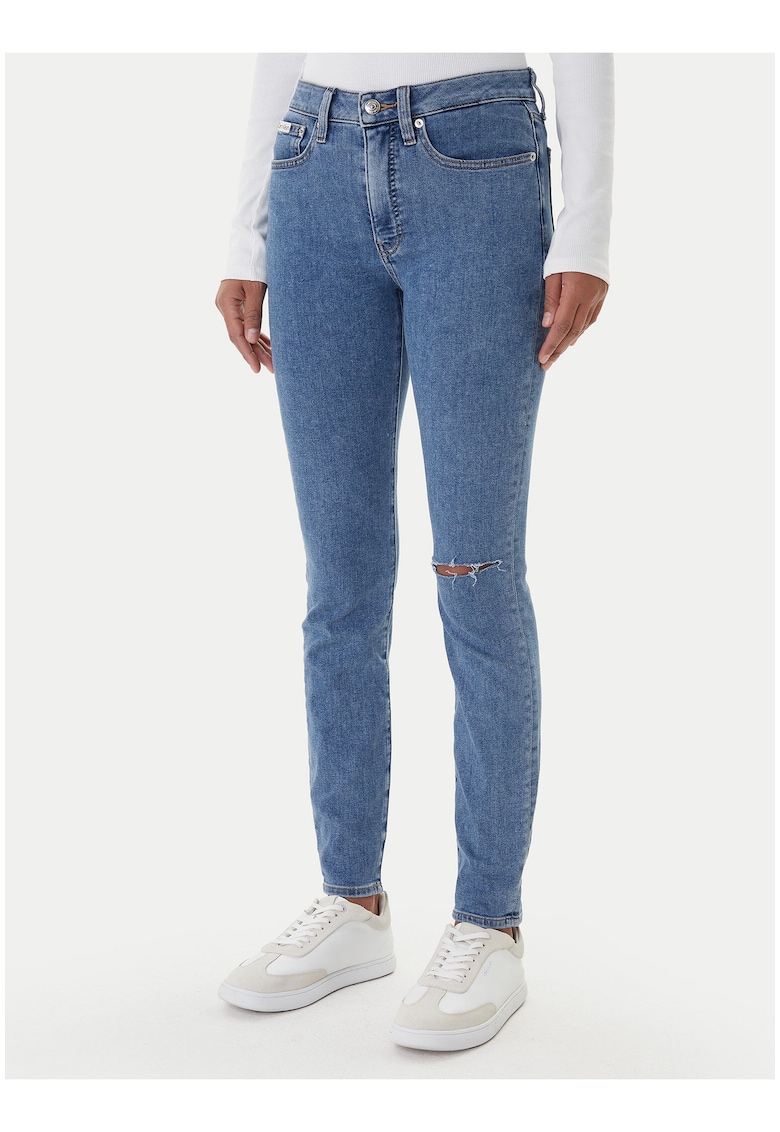 Blugi skinny cu ruptura -