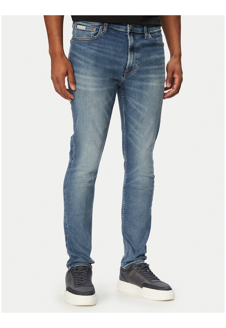 Blugi super skinny cu buzunare