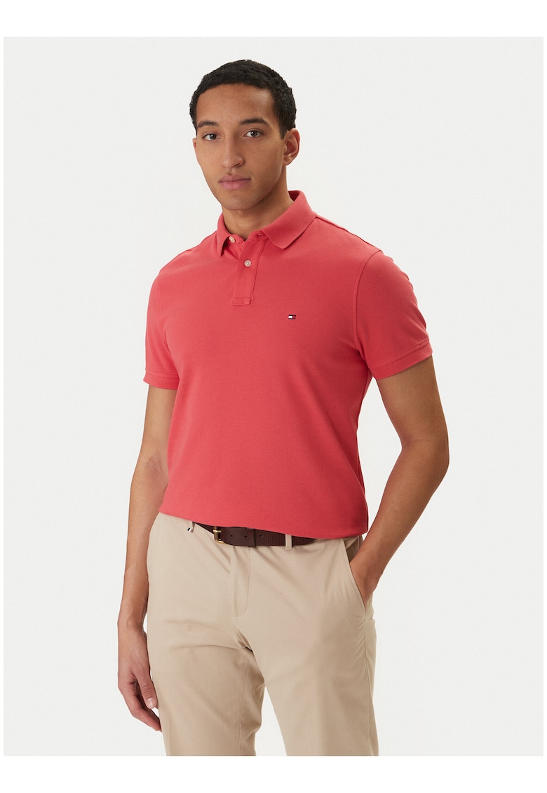 Tricou polo uni din bumbac organic.