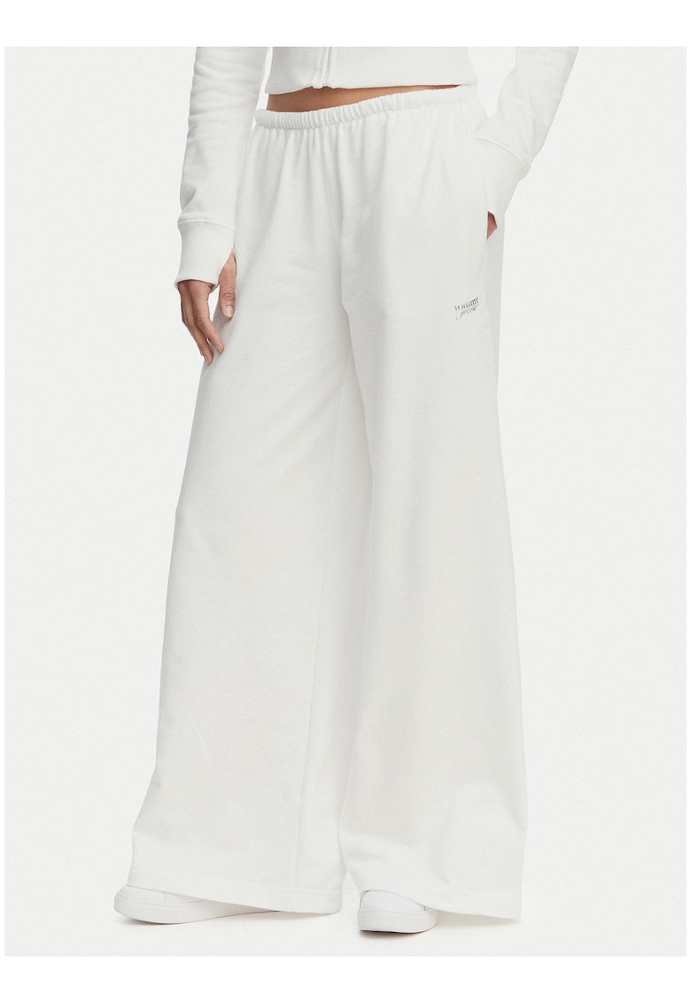 Pantaloni de trening uni cu croiala ampla