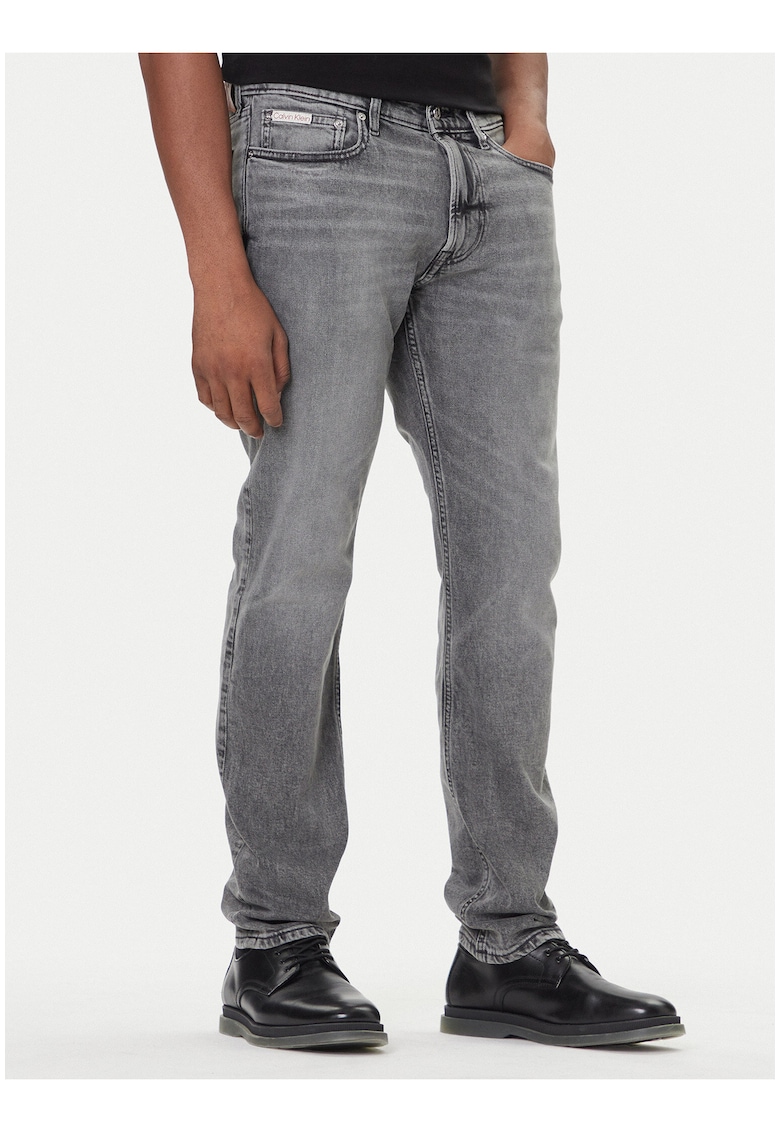 Blugi slim fit cu talie medie si buzunare multiple