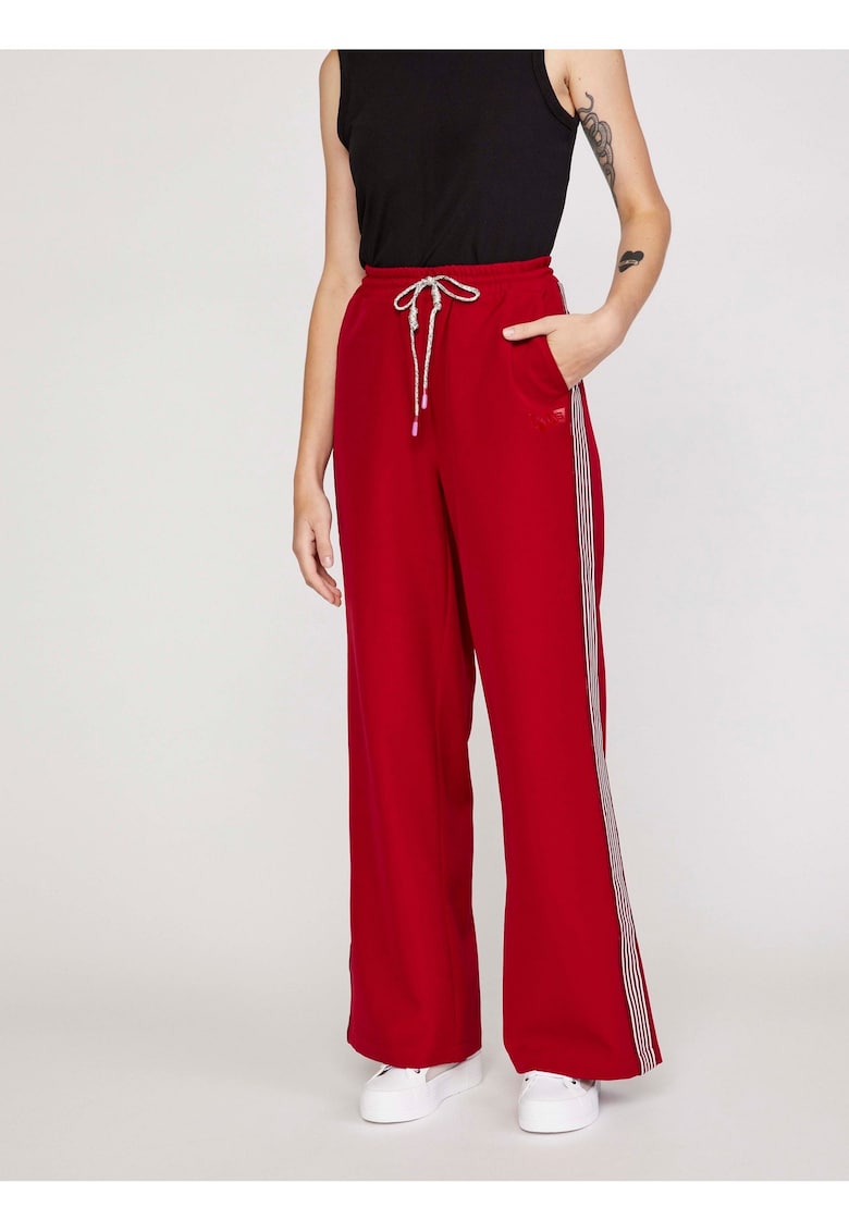 Pantaloni cu croiala ampla si snur de ajustare