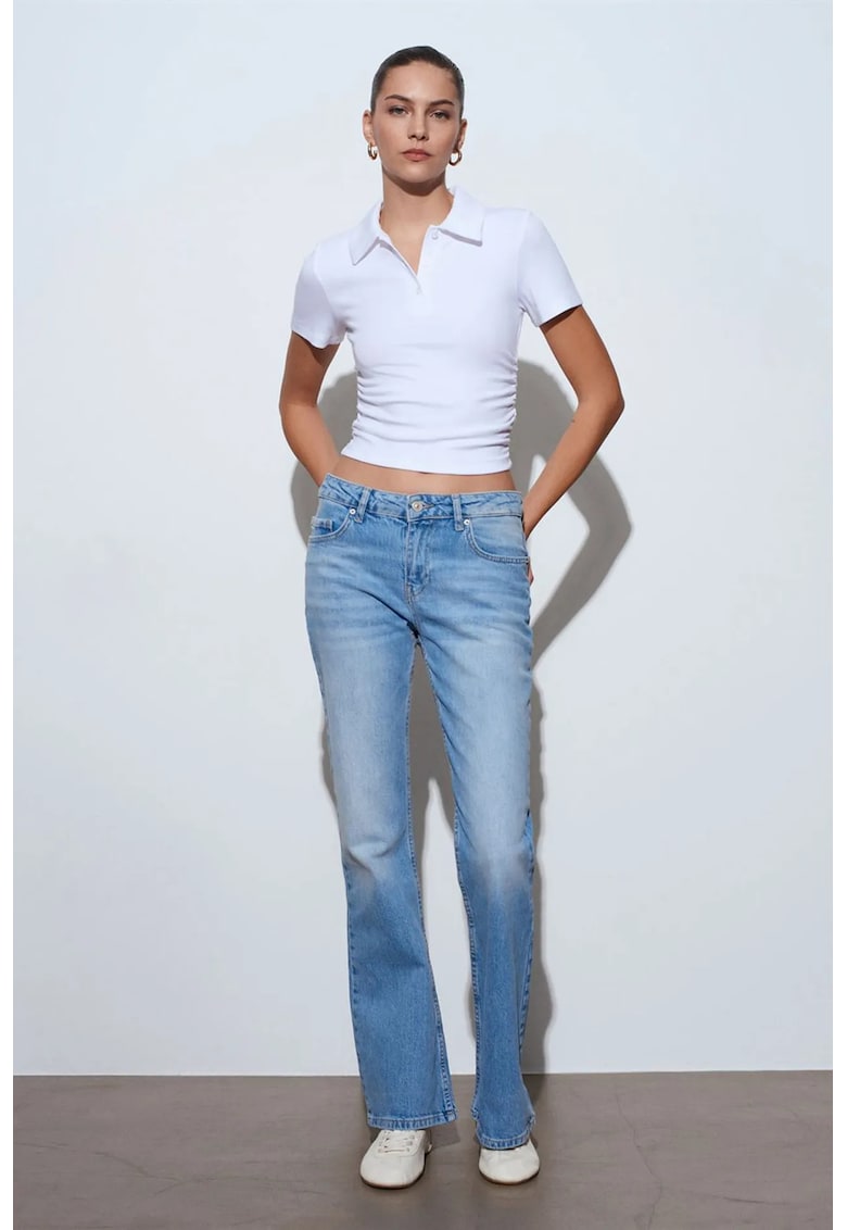 Blugi dama - Bootcut - talie joasa - denim albastru deschis-mediu - 99% bumbac