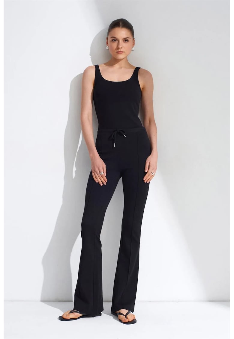 Pantaloni dama - Flare din jerseu - talie medie - Negru