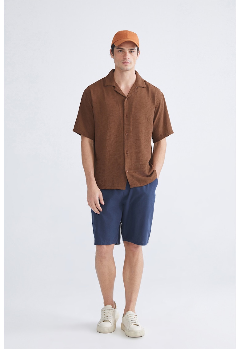 Pantaloni scurti din bumbac cu buzunare oblice frontale - Bleumarin