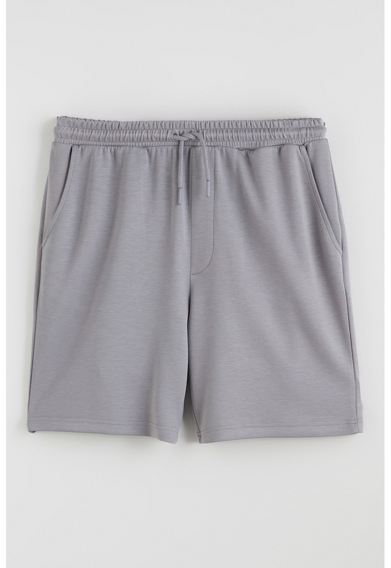 Pantaloni scurti de trening cu buzunare oblice frontale - Gri