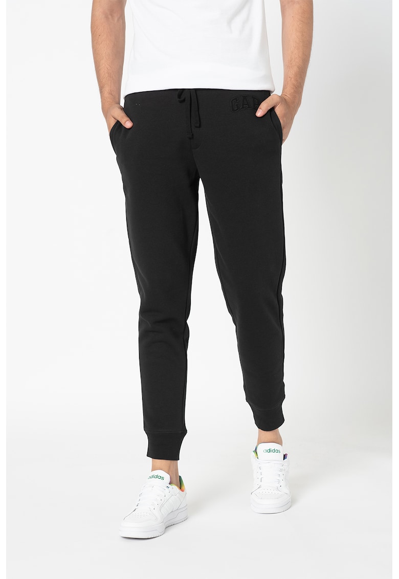 Pantaloni sport conici cu buzunare oblice