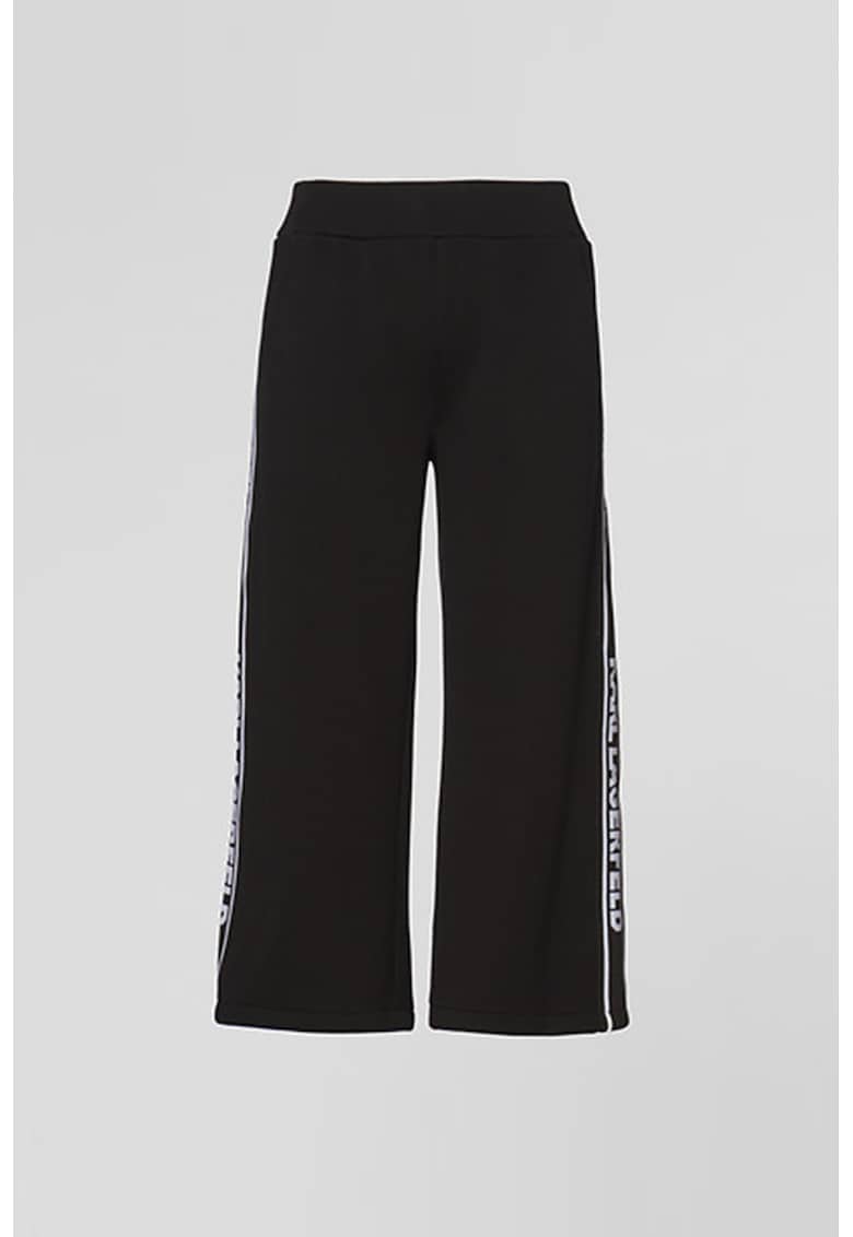 Pantaloni sport cu croiala ampla si benzi laterale cu logo