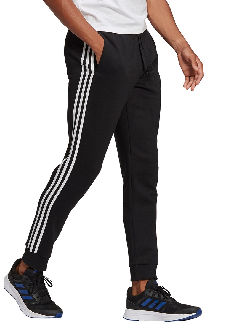 Pantaloni sport conici cu snur Essentials adidas Performance imagine noua gjx.ro