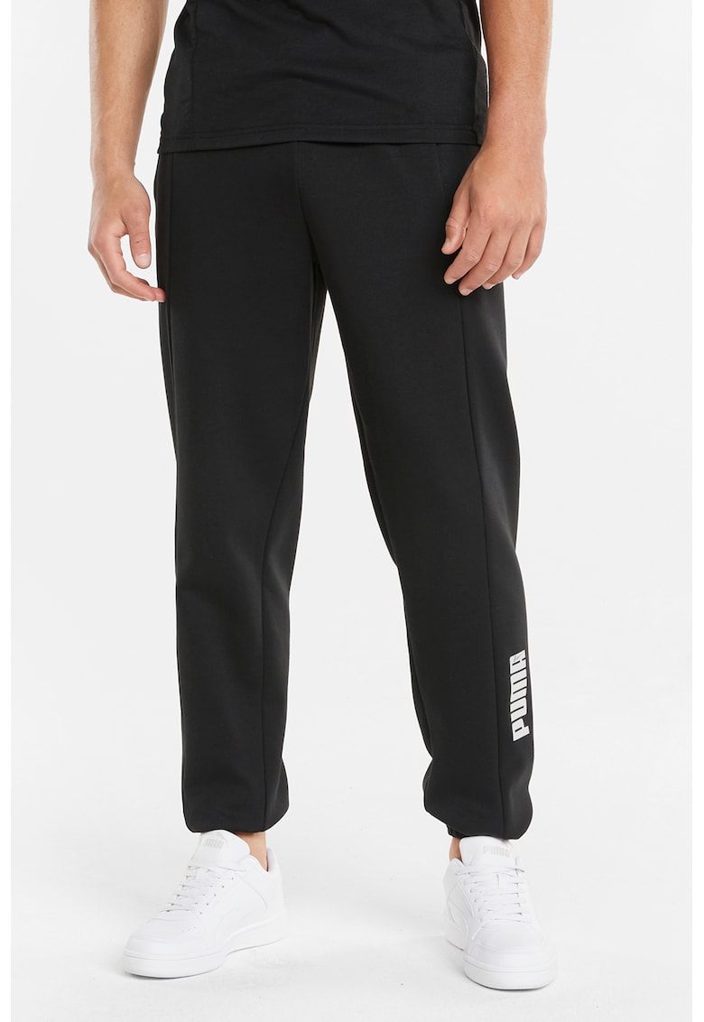 Pantaloni sport conici cu detaliu logo