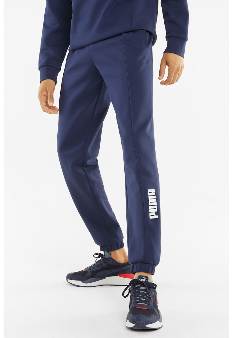 Pantaloni sport conici cu detaliu logo