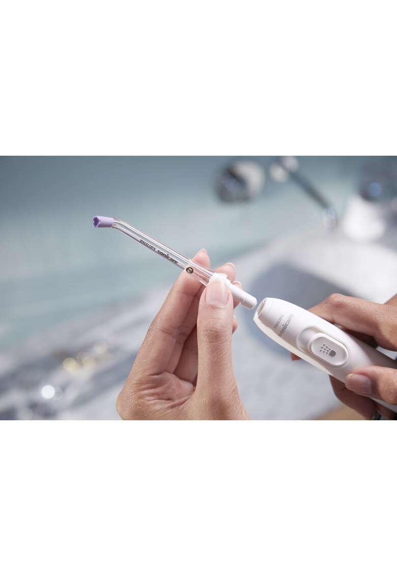 Philips Sonicare Rezerva 2 capete de curatare interdentara philips hx3062/00 - 4 jeturi consistente de apa - ghidaj din cauciuc moale delicat cu gingiile - compatibil cu aparatele de curatare interdentara power flosser