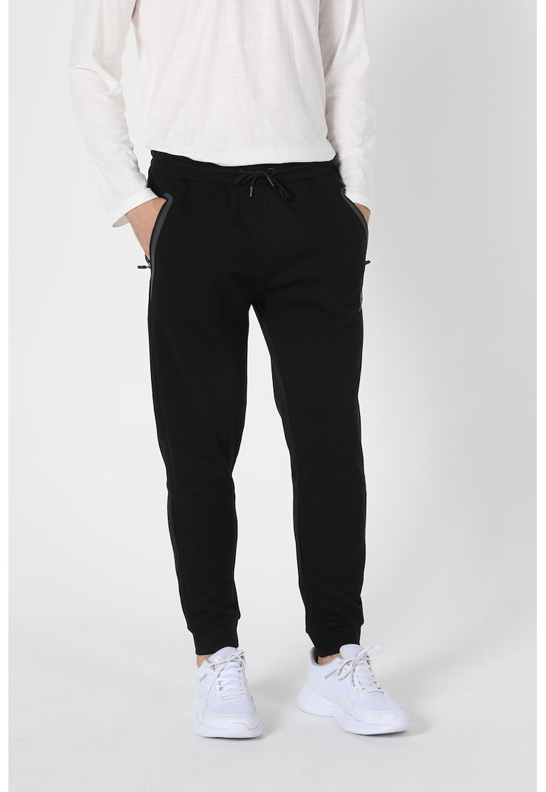 Pantaloni sport slim fit cu buzunare cu fermoar